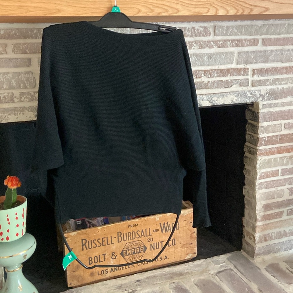 Black, bat-winged ribbed sweater